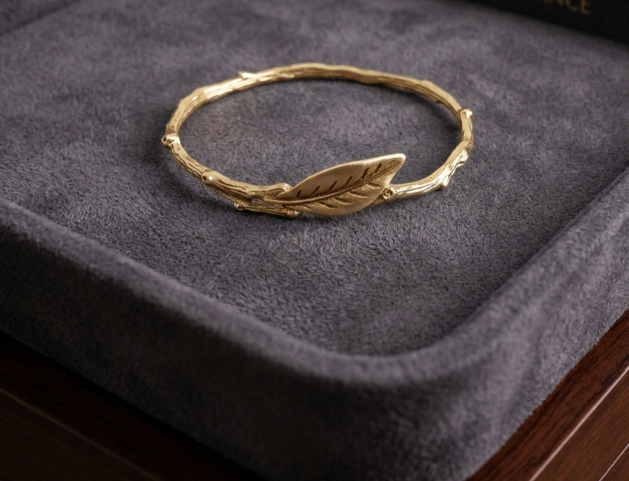 Botanical Gold-Tone Textured Twig Bangle with Leaf Accent